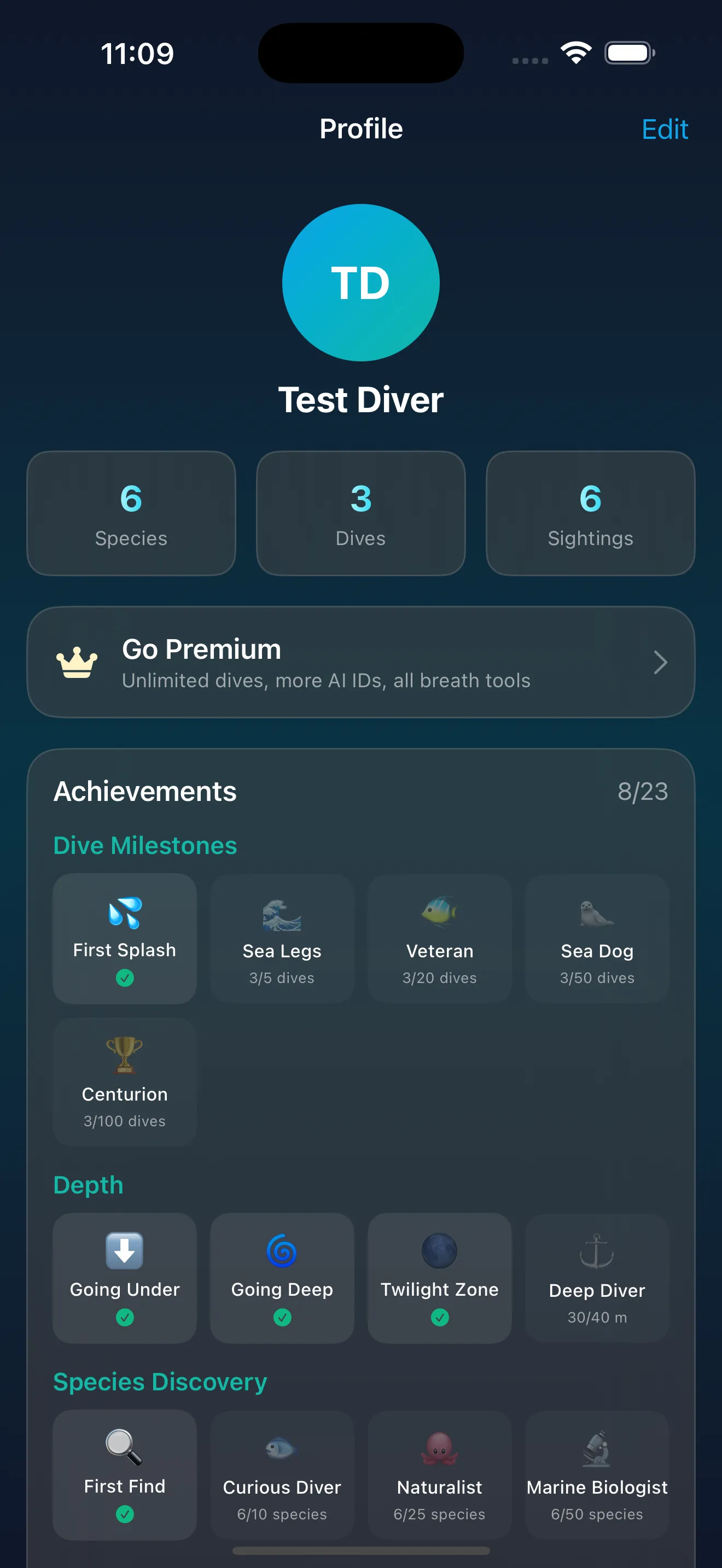 AquaLog Test Diver profile screen with sample statistics and achievement tiles.